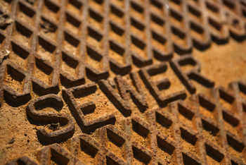 Close-up of sewer grate.